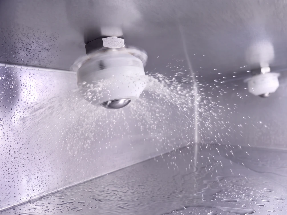 Rotary nozzles inside a DISCHER bedpan washer